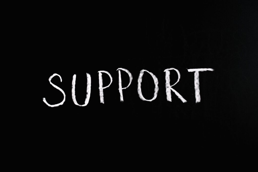 support written in white on black background